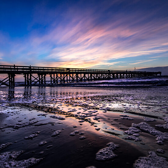 Ocean Isle Beach Pier At Sunrise by Dwayne Schmidt